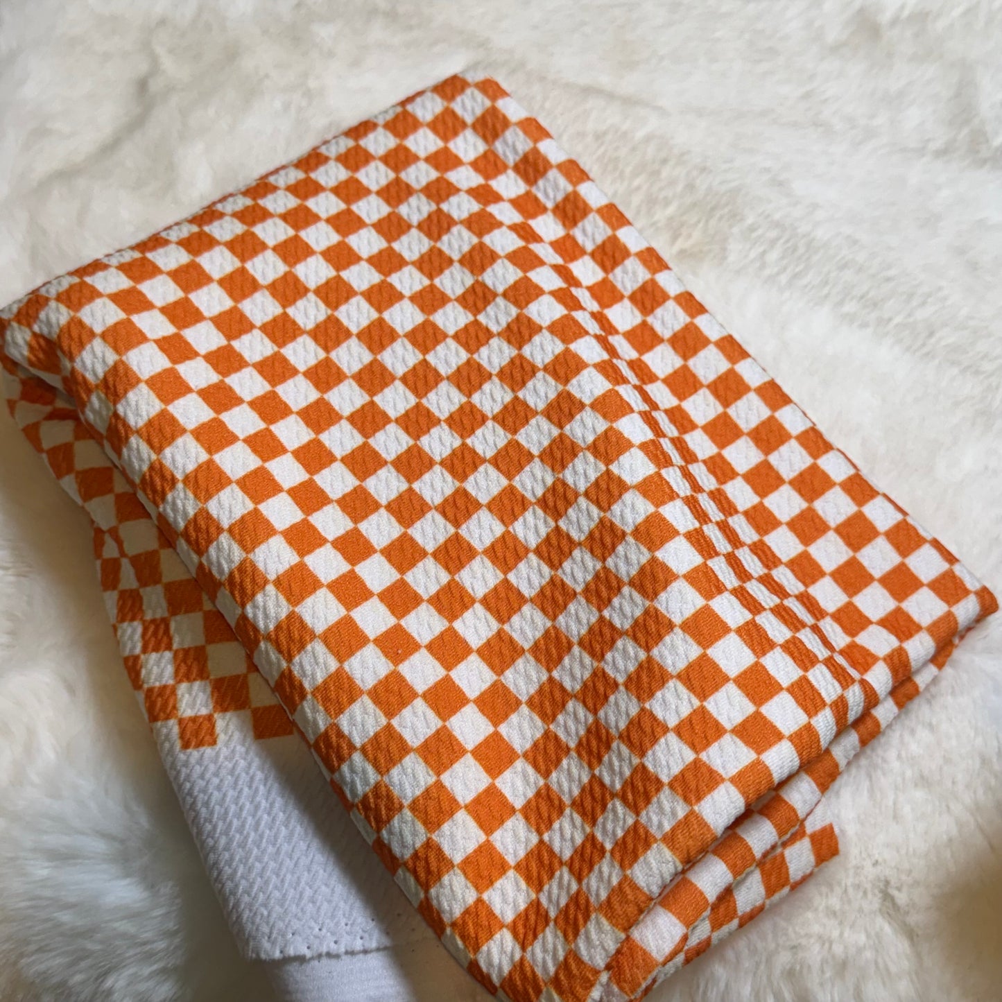 little orange checks